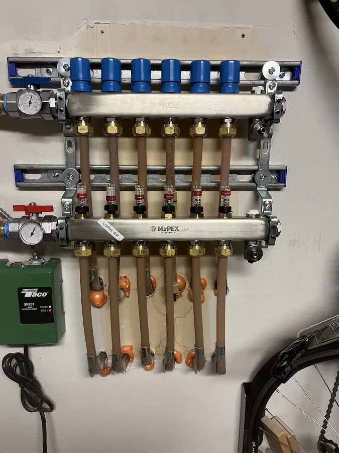 Plumber performing Water Heater Repair at a residential property in Princeton